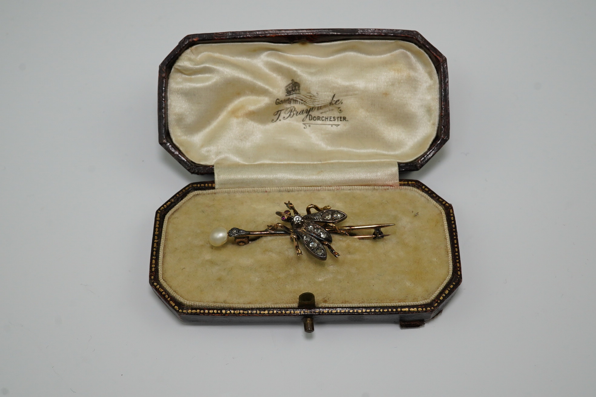 A Victorian gold and silver, pearl, rose and old cut diamond set 'bug' bar brooch